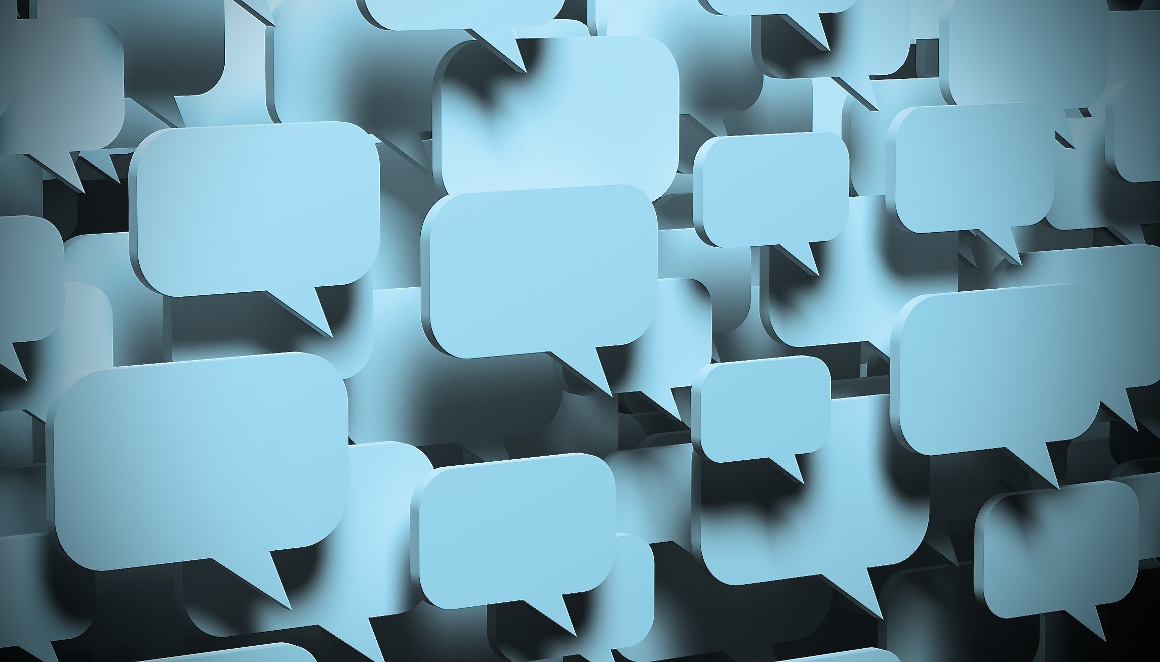 An image of blank, overlapped, pale blue speech bubbles, floating in a cluster.